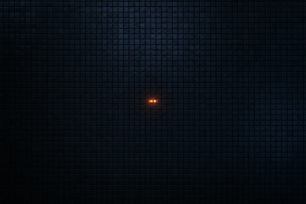 Muro inmenso de azulejos idénticos y fríos con solo dos encendidos en naranja